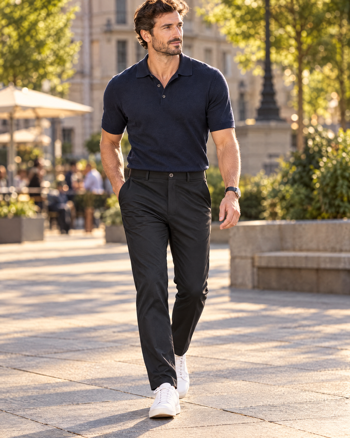 Men's smart casual black straight leg pants with navy polo, lifestyle