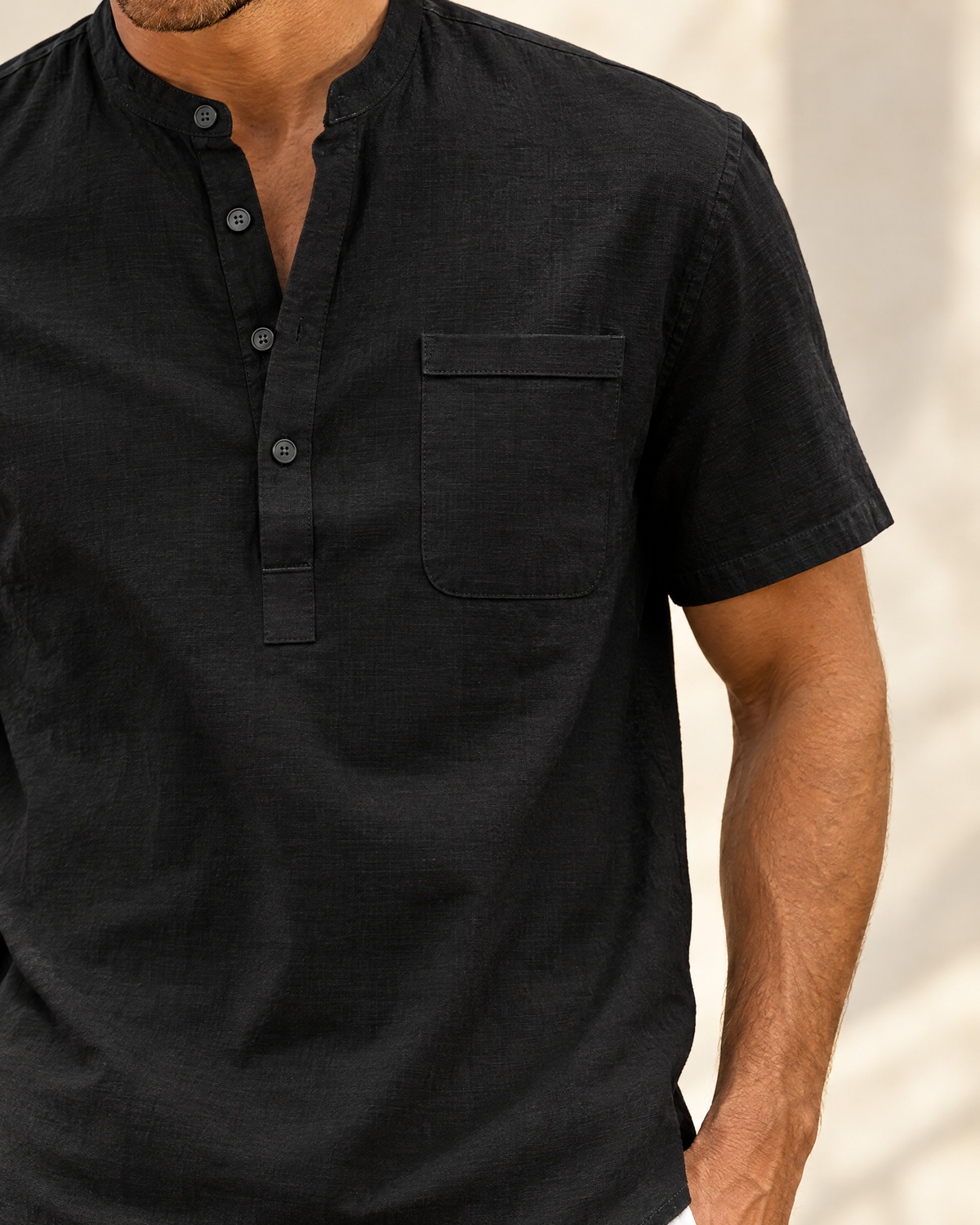 Alden men's black henley shirt chest pocket and short sleeve detail