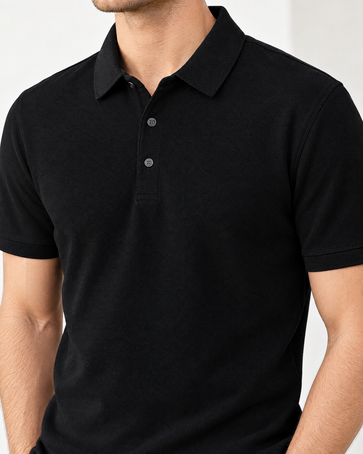 Black men's knit polo shirt short sleeve fit detail