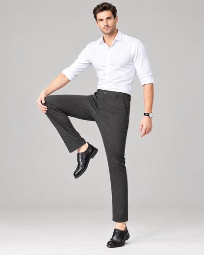 Men's dark grey stretch chino dress pants with white shirt and black shoes