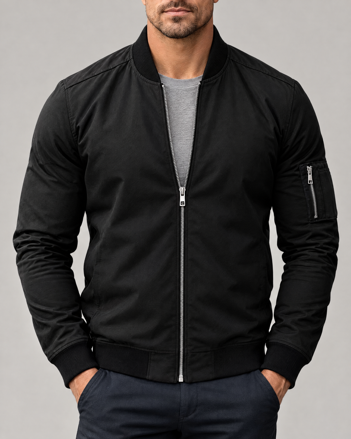 Black windbreaker bomber jacket for men, studio front view