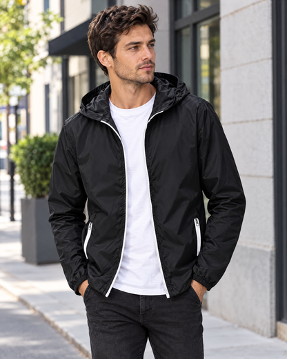 Man wearing the Rowan black lightweight hooded windbreaker