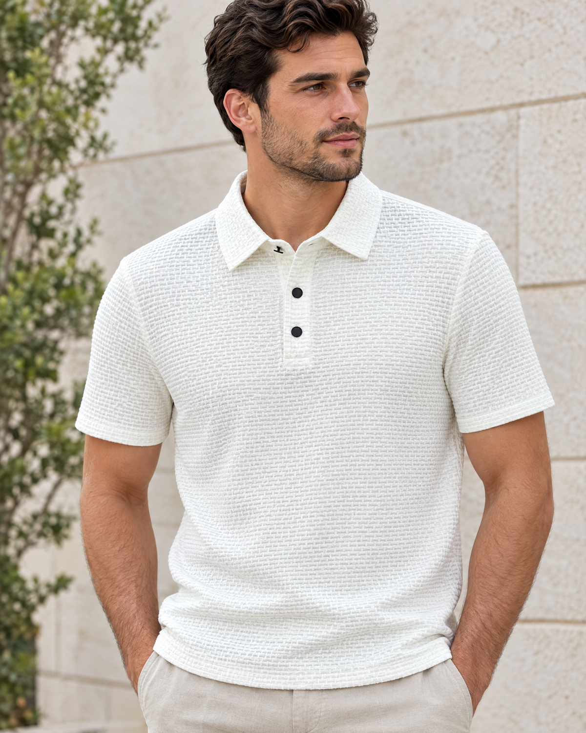Man wearing the Calder waffle knit polo shirt in White