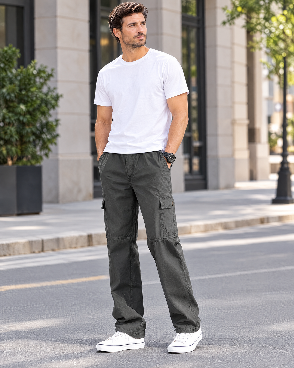 Man wearing the Garrett army green cotton cargo pants on a city street