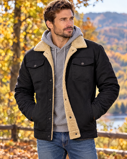 Man wearing the Brannon black sherpa-lined trucker jacket